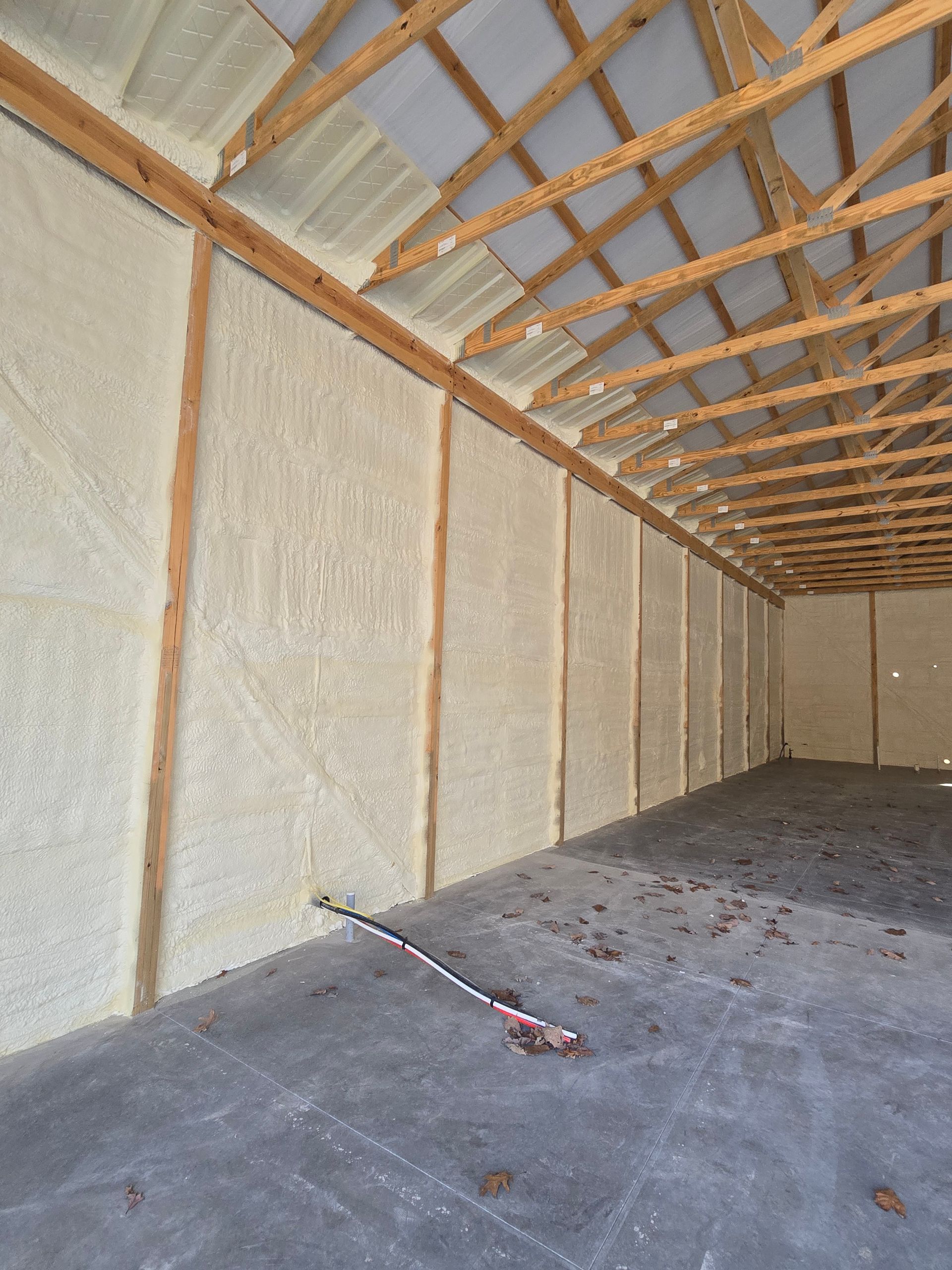 A large room with a lot of insulation on the walls and ceiling.