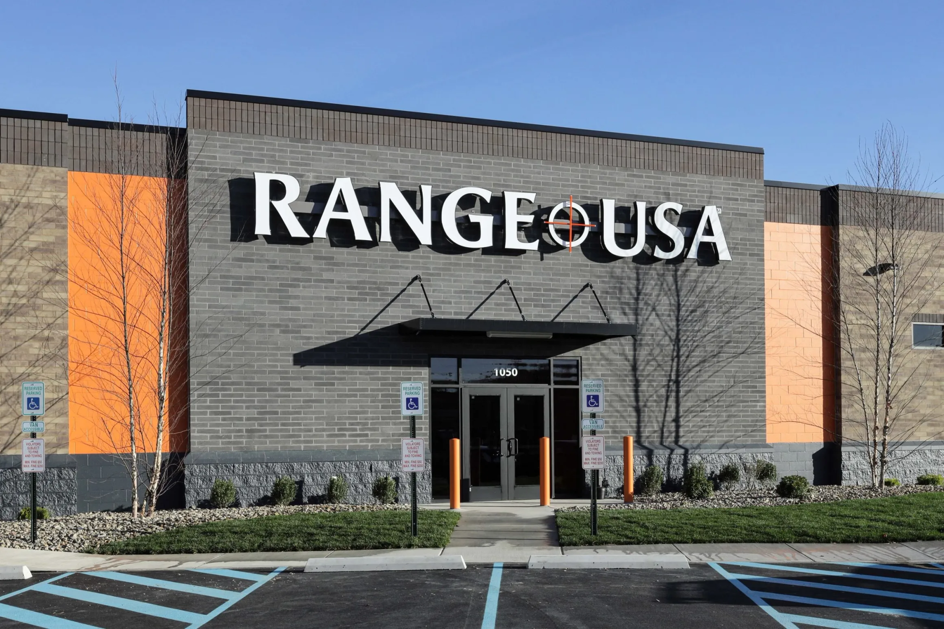 Exterior of Range USA building with large sign and entrance.