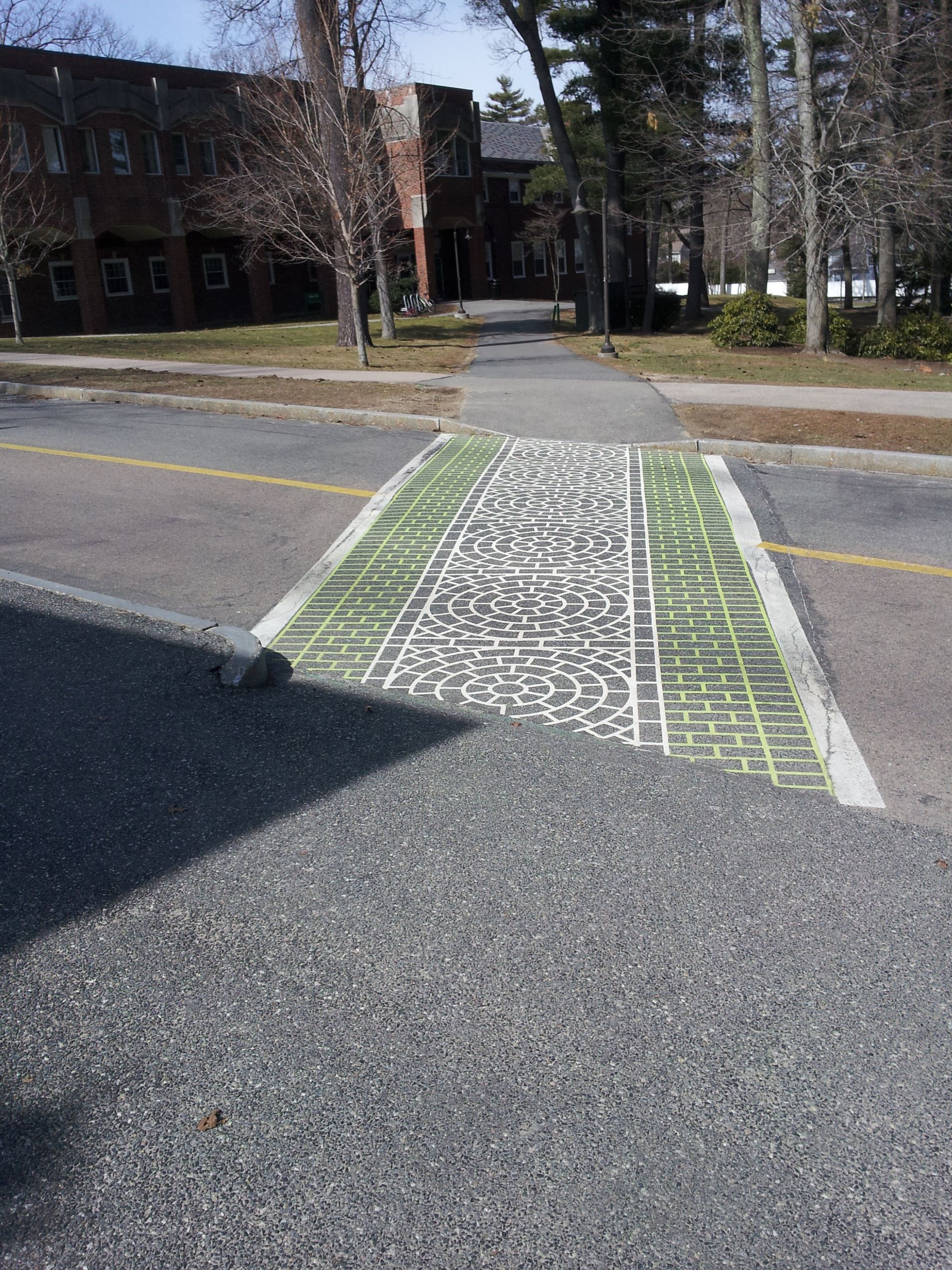 A crosswalk with a qr code painted on it