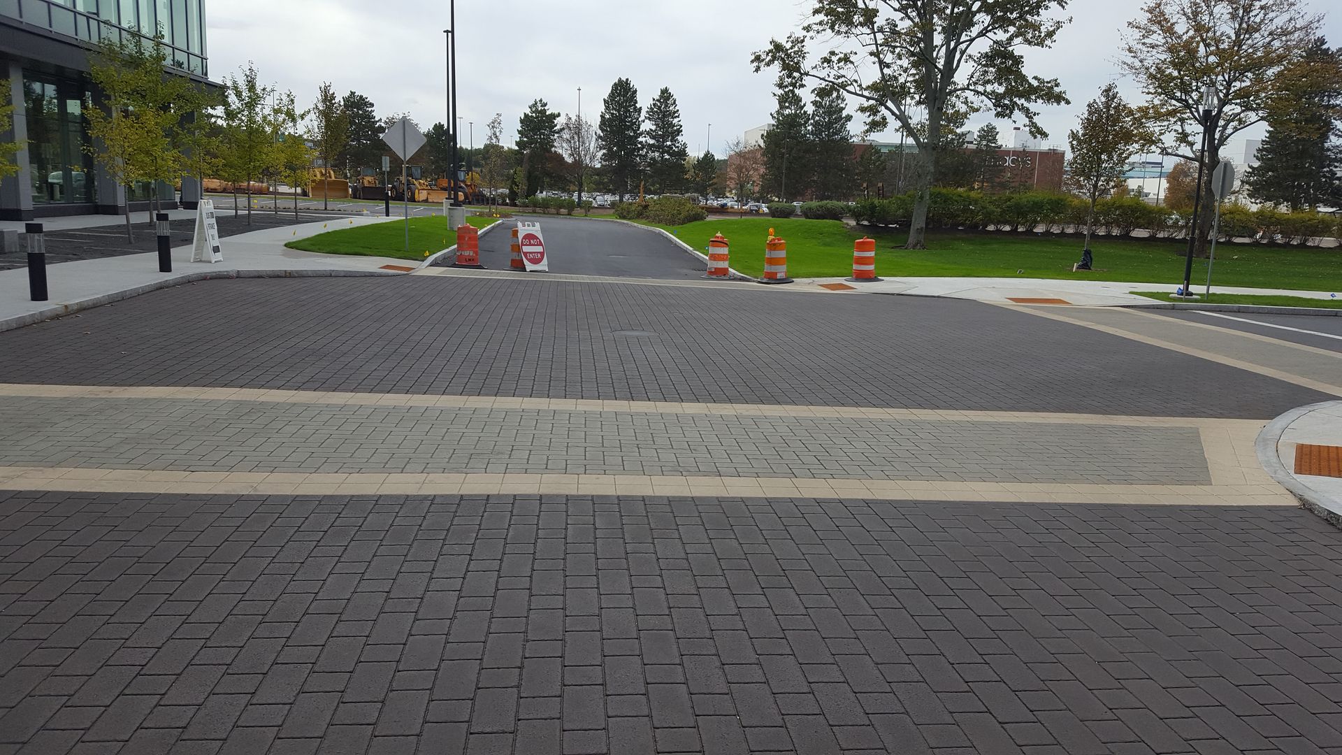 A brick road with a do not enter sign on it