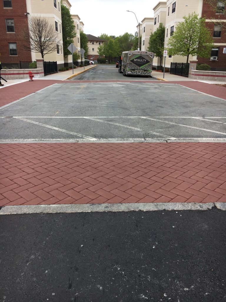 A military vehicle is parked on the side of the road