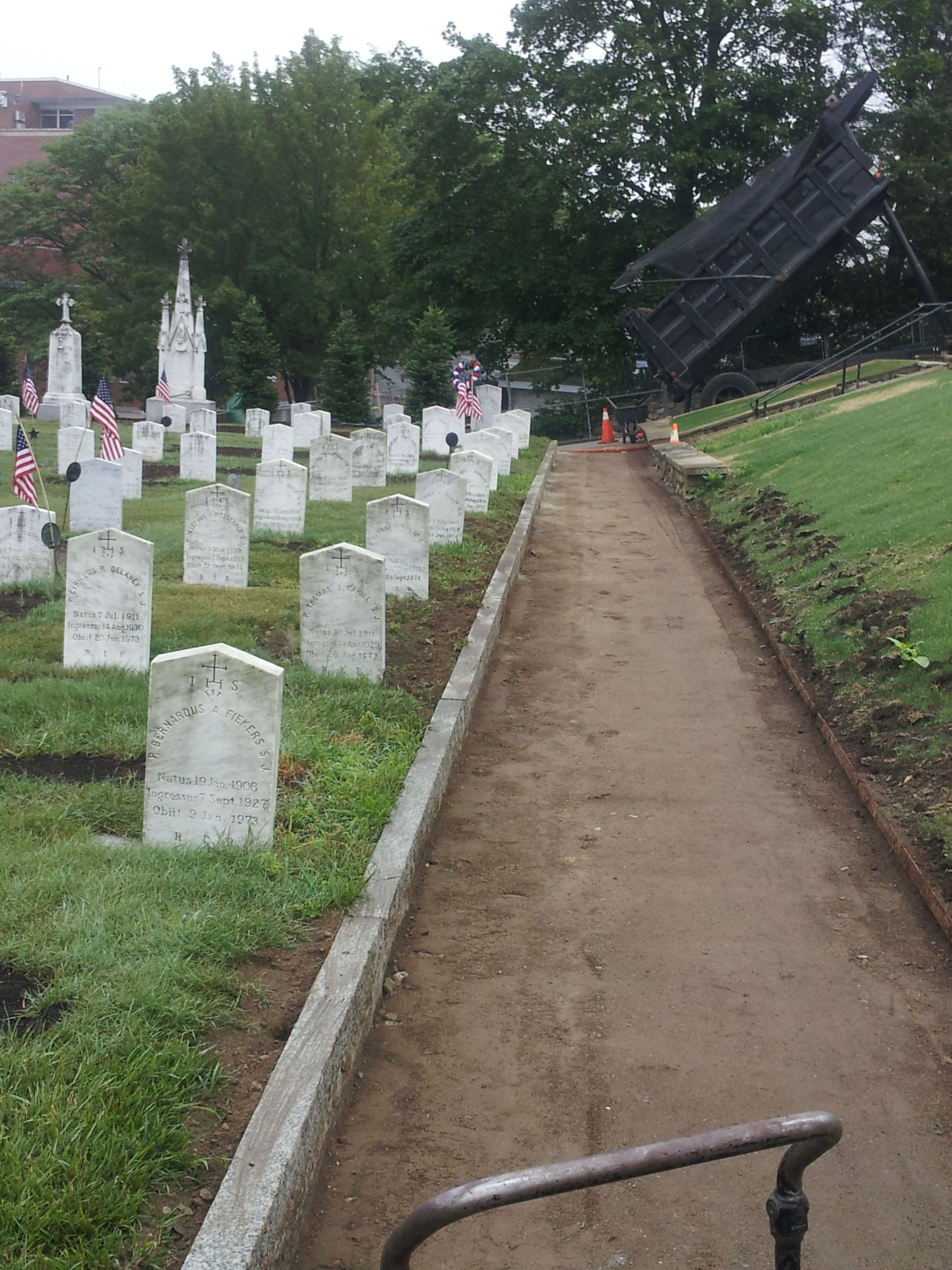A graveyard with a path going through it