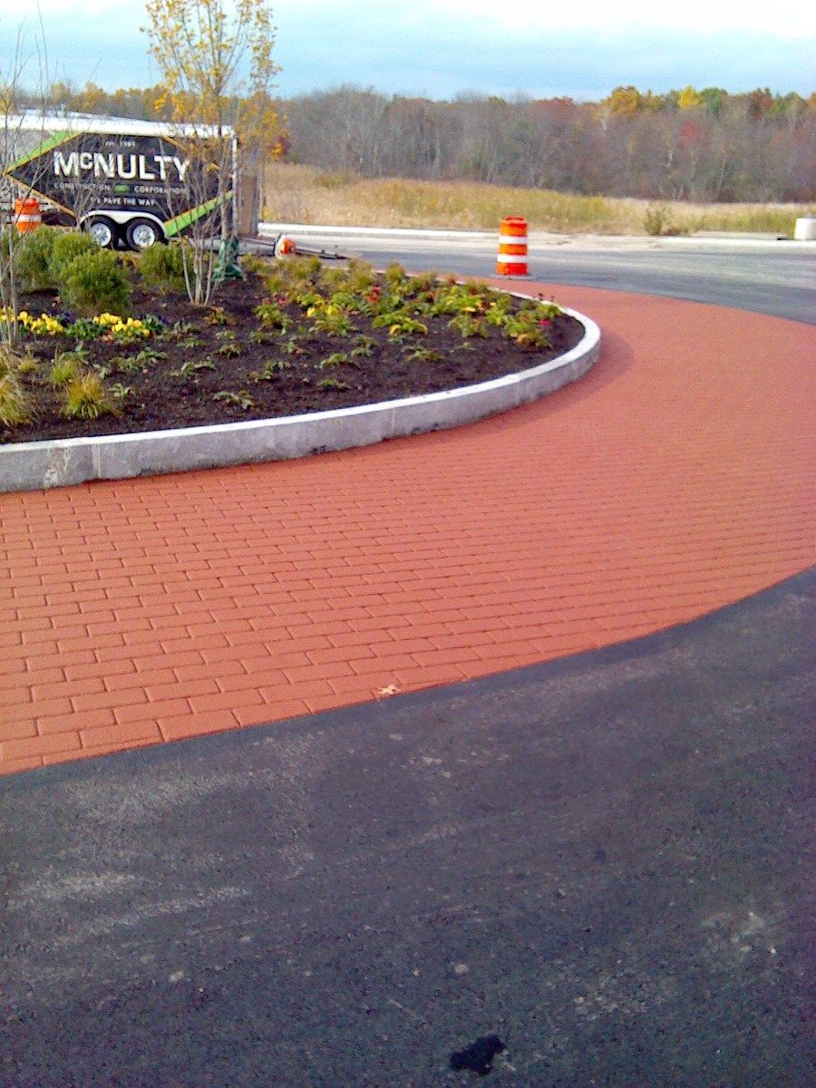 A roundabout with a sign that says mfnulty on it