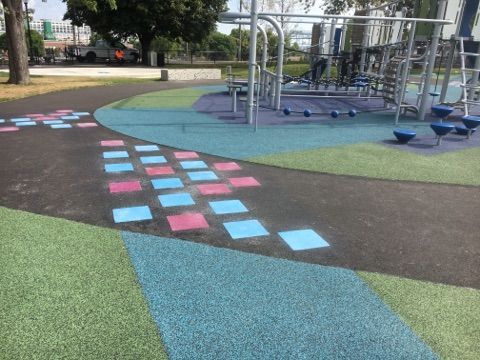 A playground with a checkered pattern on the ground