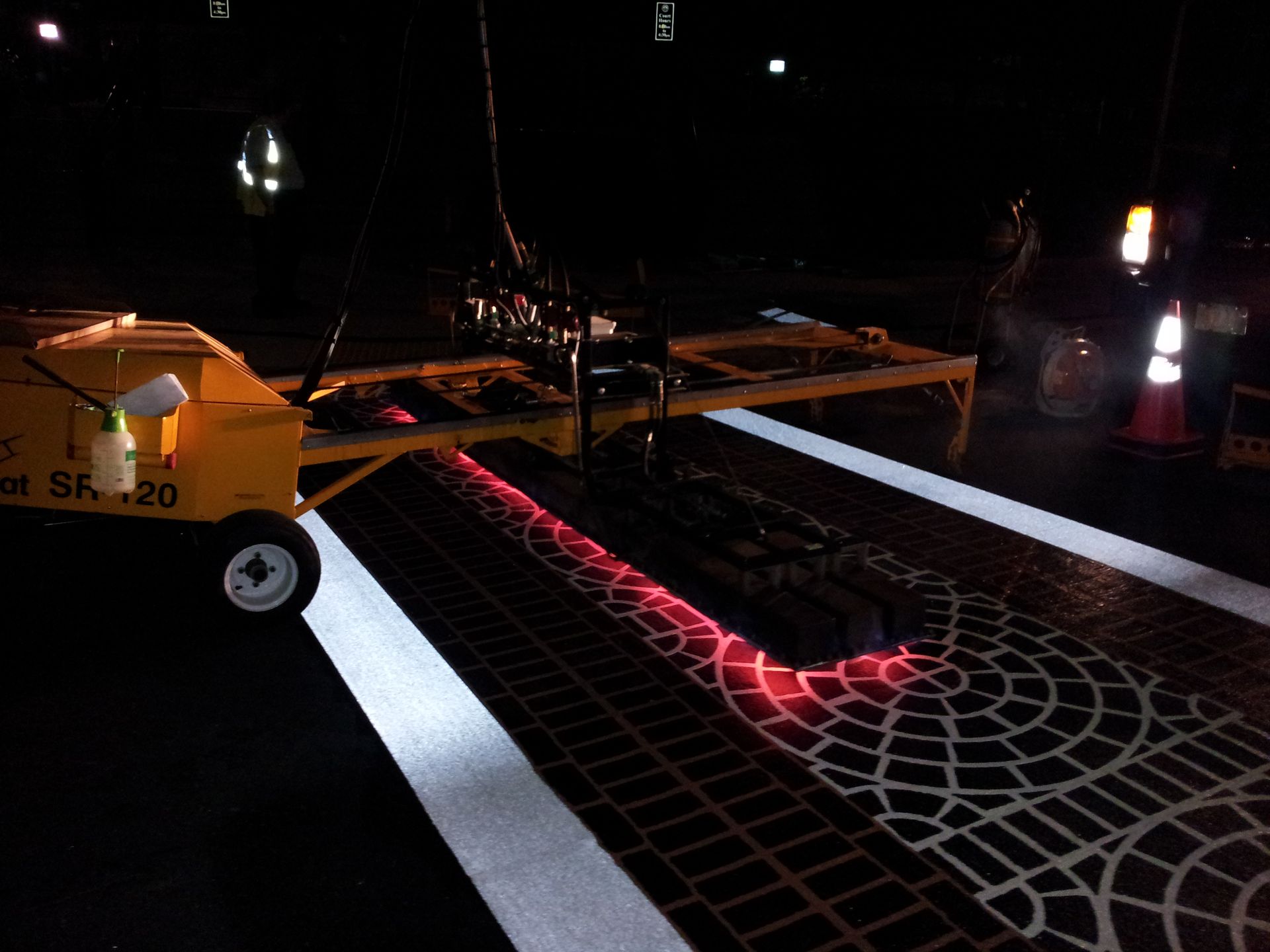 A yellow vehicle with the number 20 on it