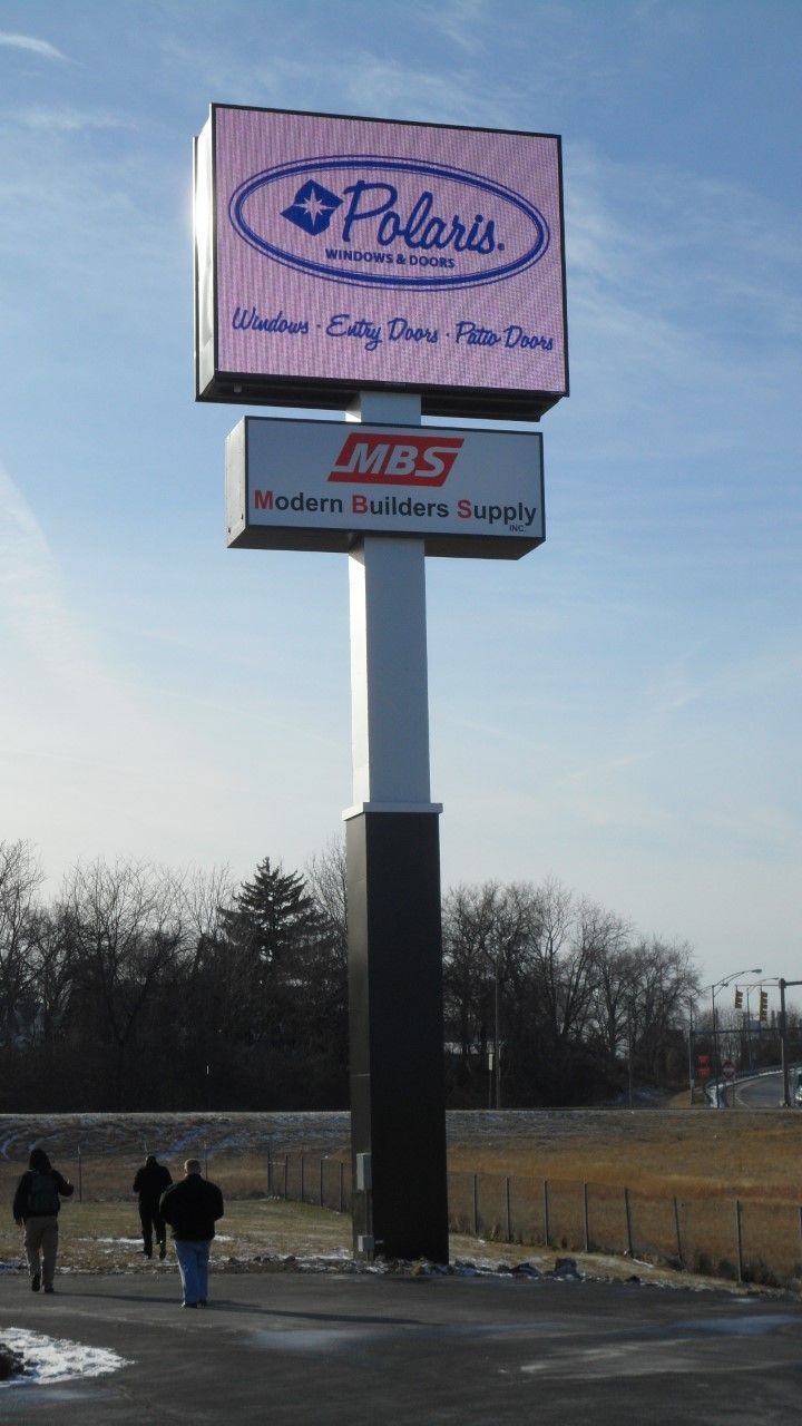 Tall outdoor sign with Polaris logo and