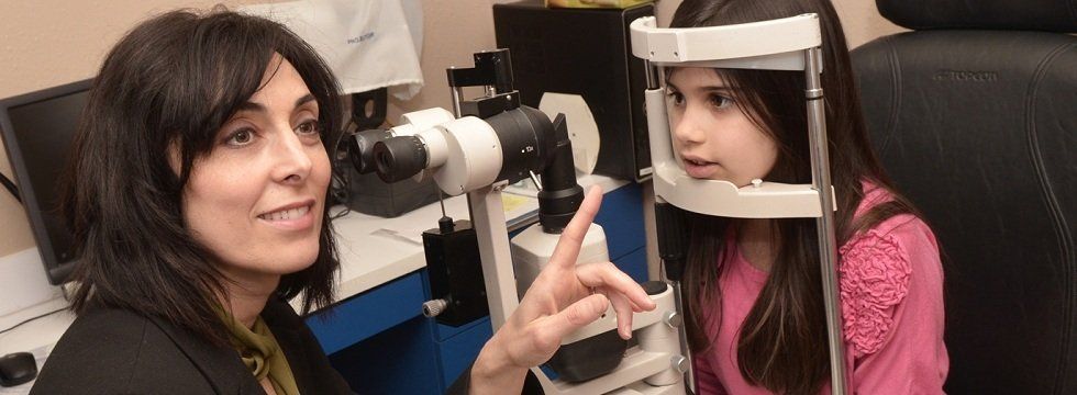 Eye Test Of Girl Child In Optical