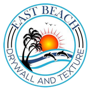 East Beach Drywall and Texture logo with sunset, palm trees, and wave graphics