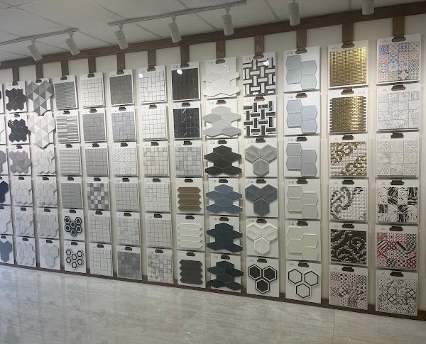 A wall with many different tiles on it