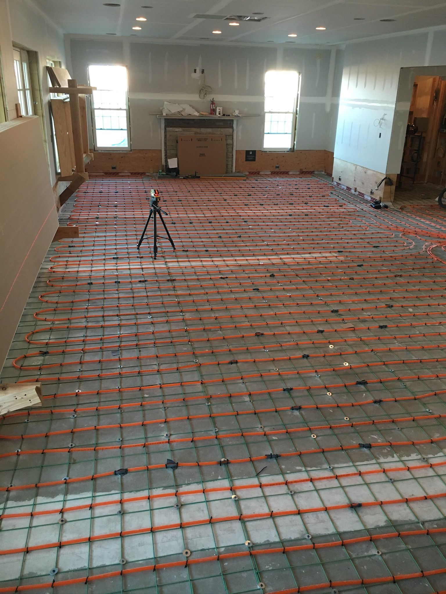 a room with a lot of wires on the floor