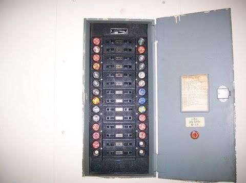 an electrical box with a lot of wires in it