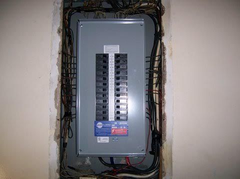 a close-up of an electrical box on a wall