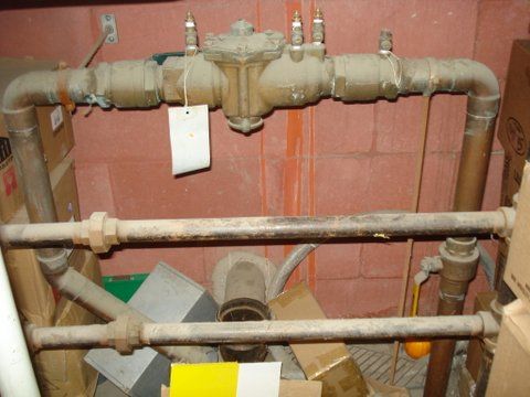 a dirty pipe with a tag attached to it