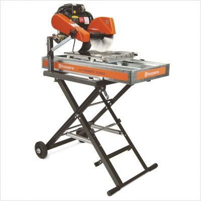 Portable wet tile saw on a wheeled stand with orange motor housing and metal cutting table