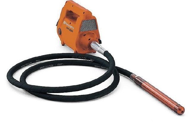 Orange handheld industrial tool with a black coiled hose and copper nozzle end