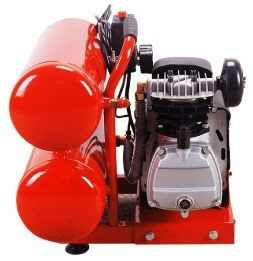 Red air compressor with twin tanks and black motor on a red base