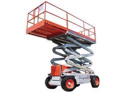 Red scissor lift with orange platform raised high on four wheels.