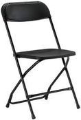 Black folding chair with padded seat and backrest on a white background