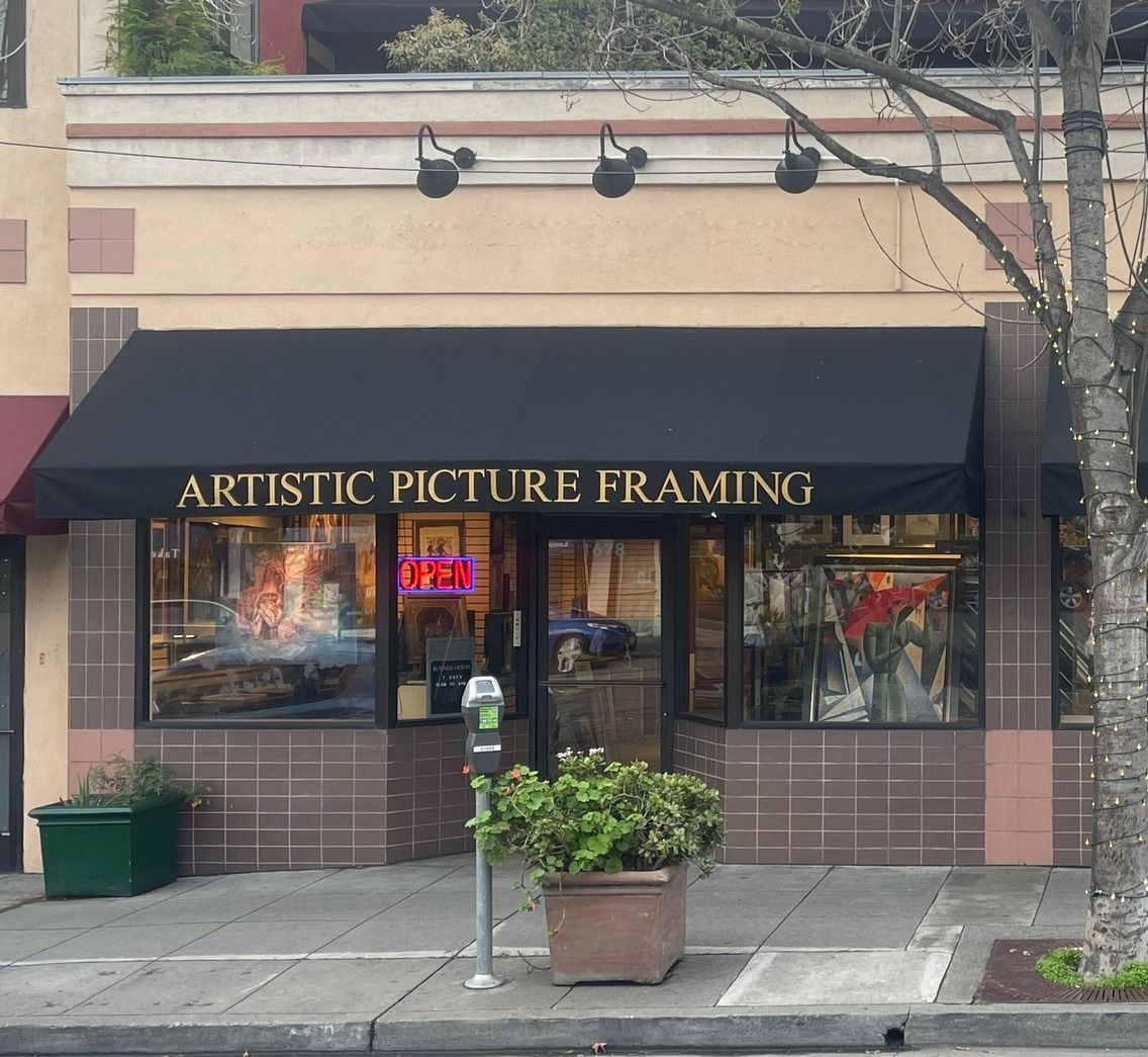 Artistic Picture Framing store front with a black awning
