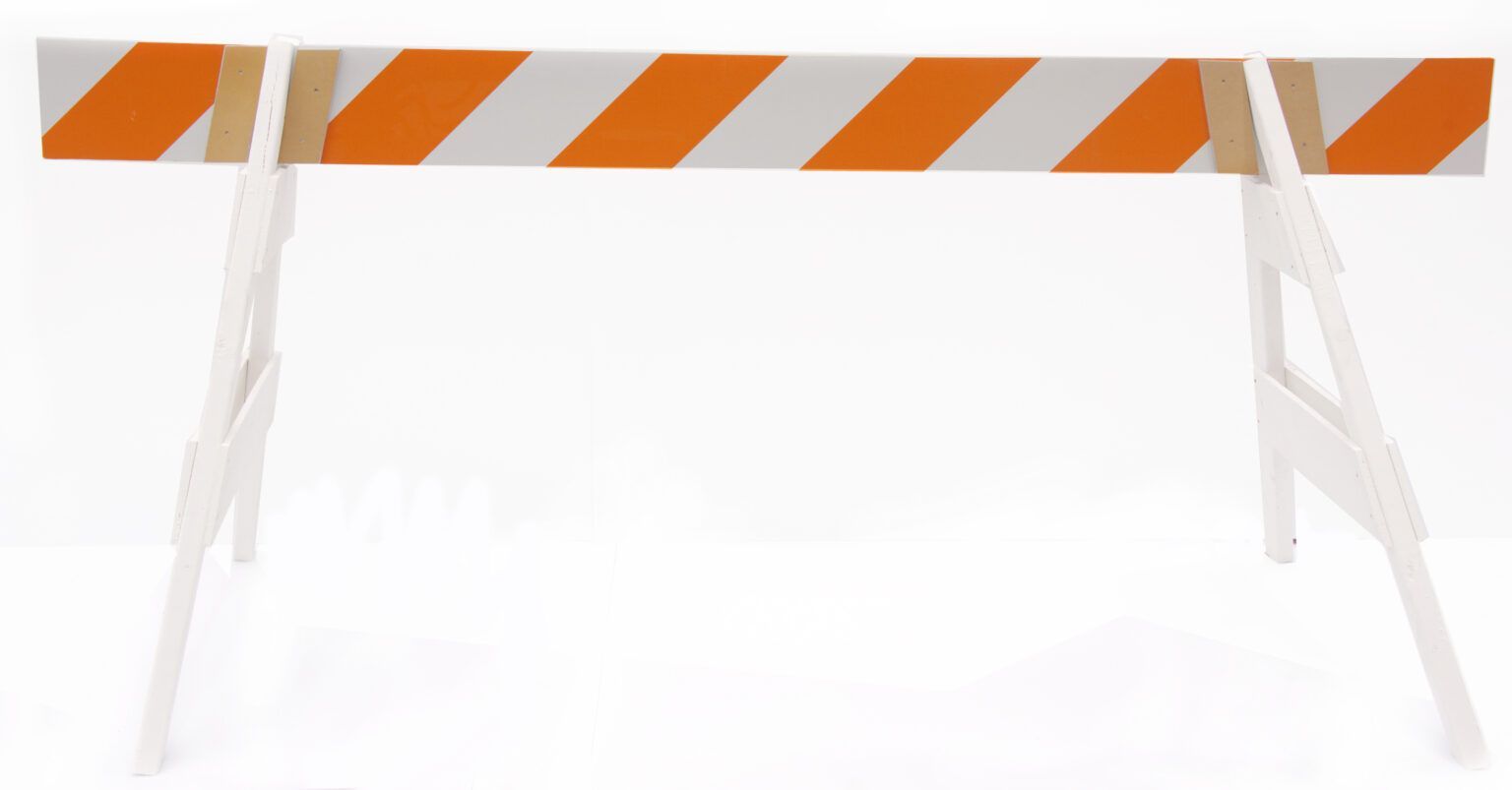 A white and orange striped road barrier on a white background.