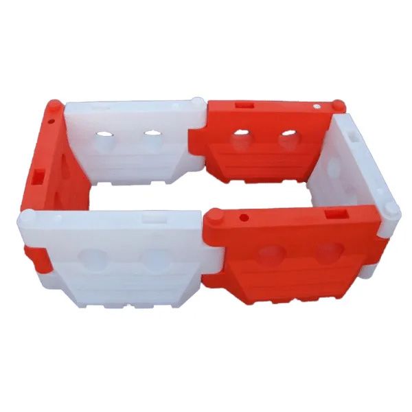 A red and white plastic barrier on a white background