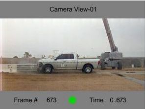 A white truck is parked