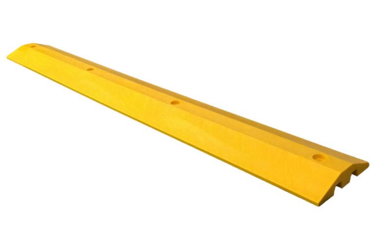A yellow speed bump