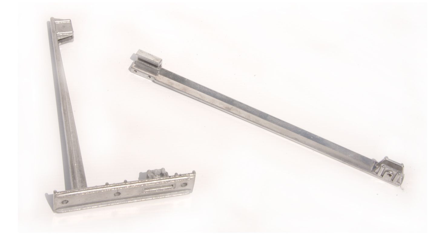 A pair of metals sitting next to each other on a white surface.