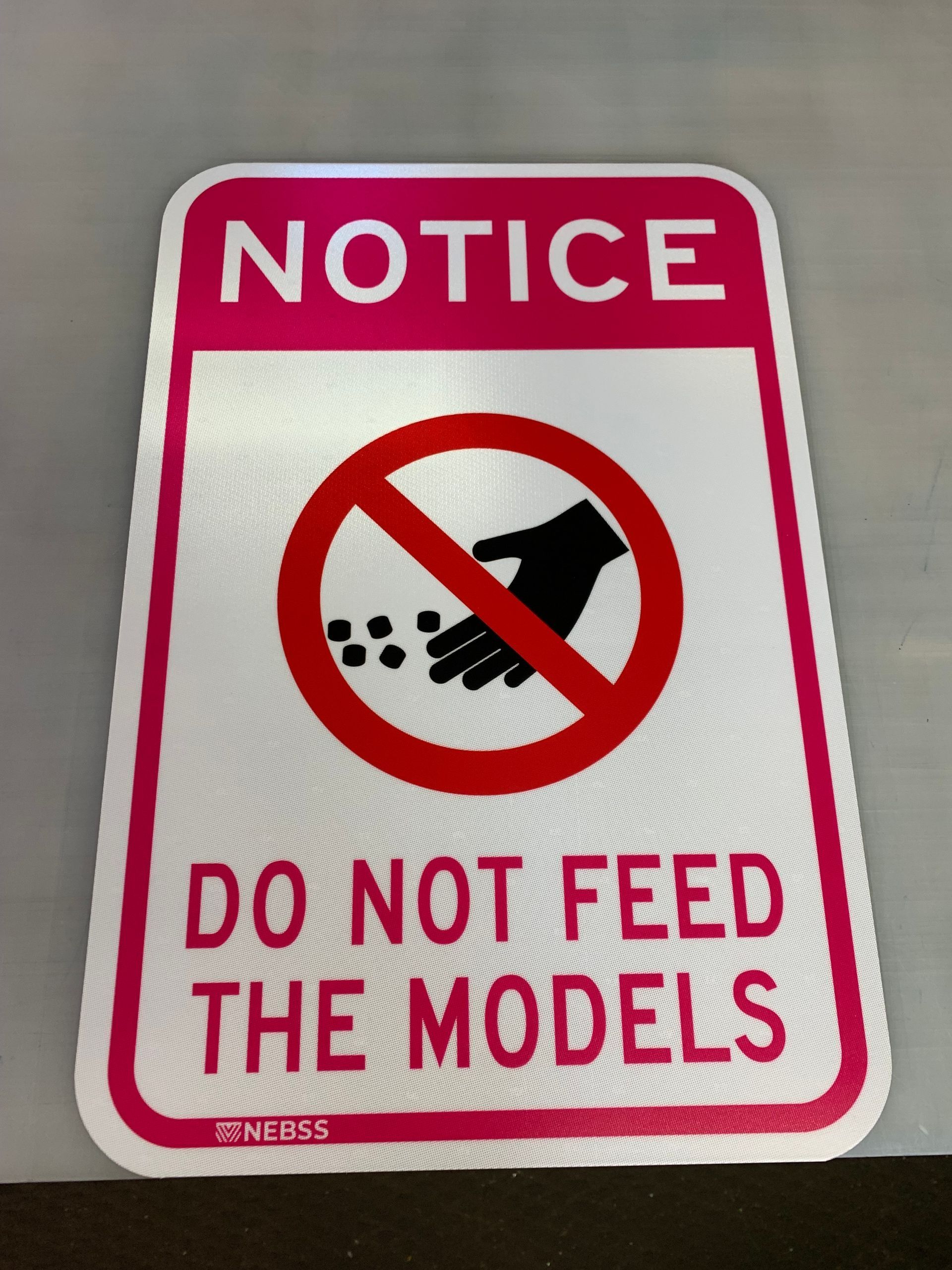 A sign that says notice do not feed the models
