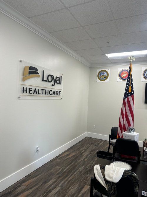 A room with a sign on the wall that says 