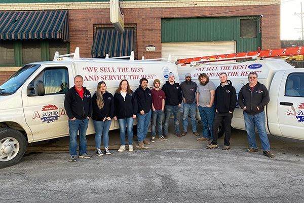 The group of employees standing