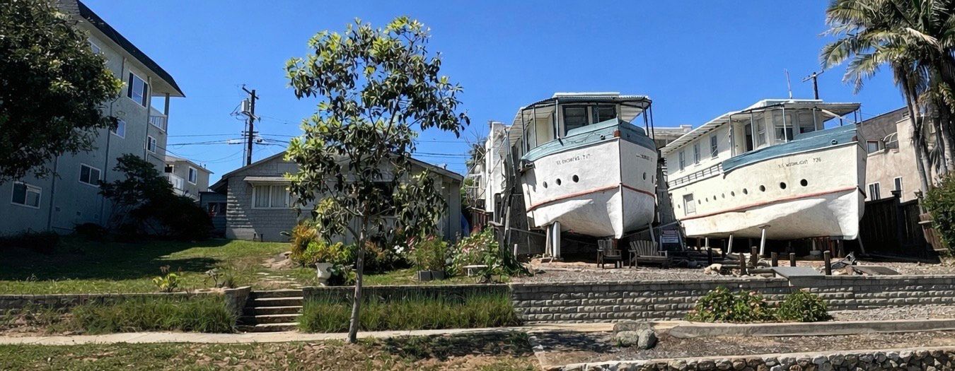 Boat houses in Encinitas, California near coastal residential service areas.