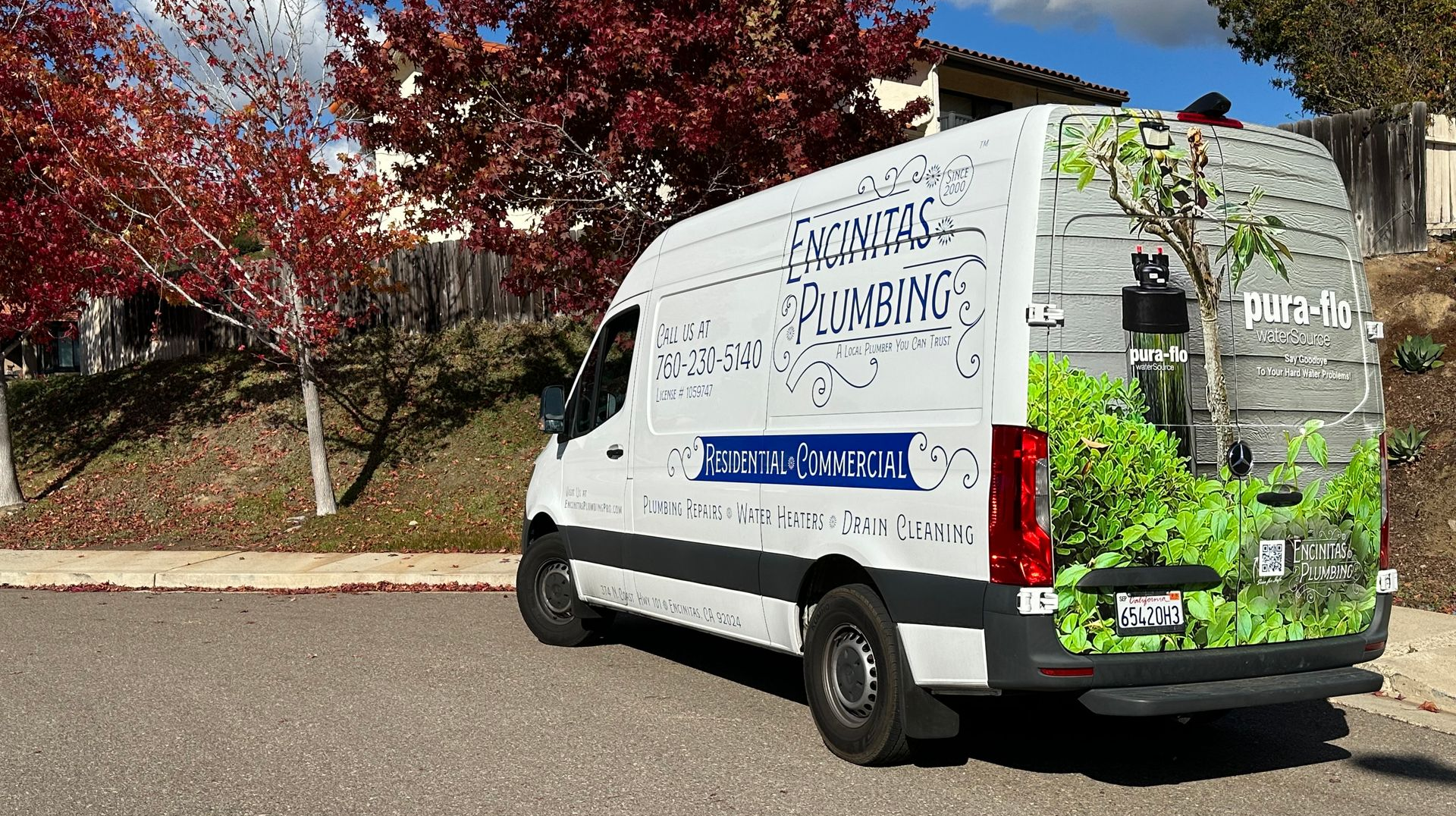 Encinitas Plumbing service van parked in a North County San Diego neighborhood while providing residential plumbing services.