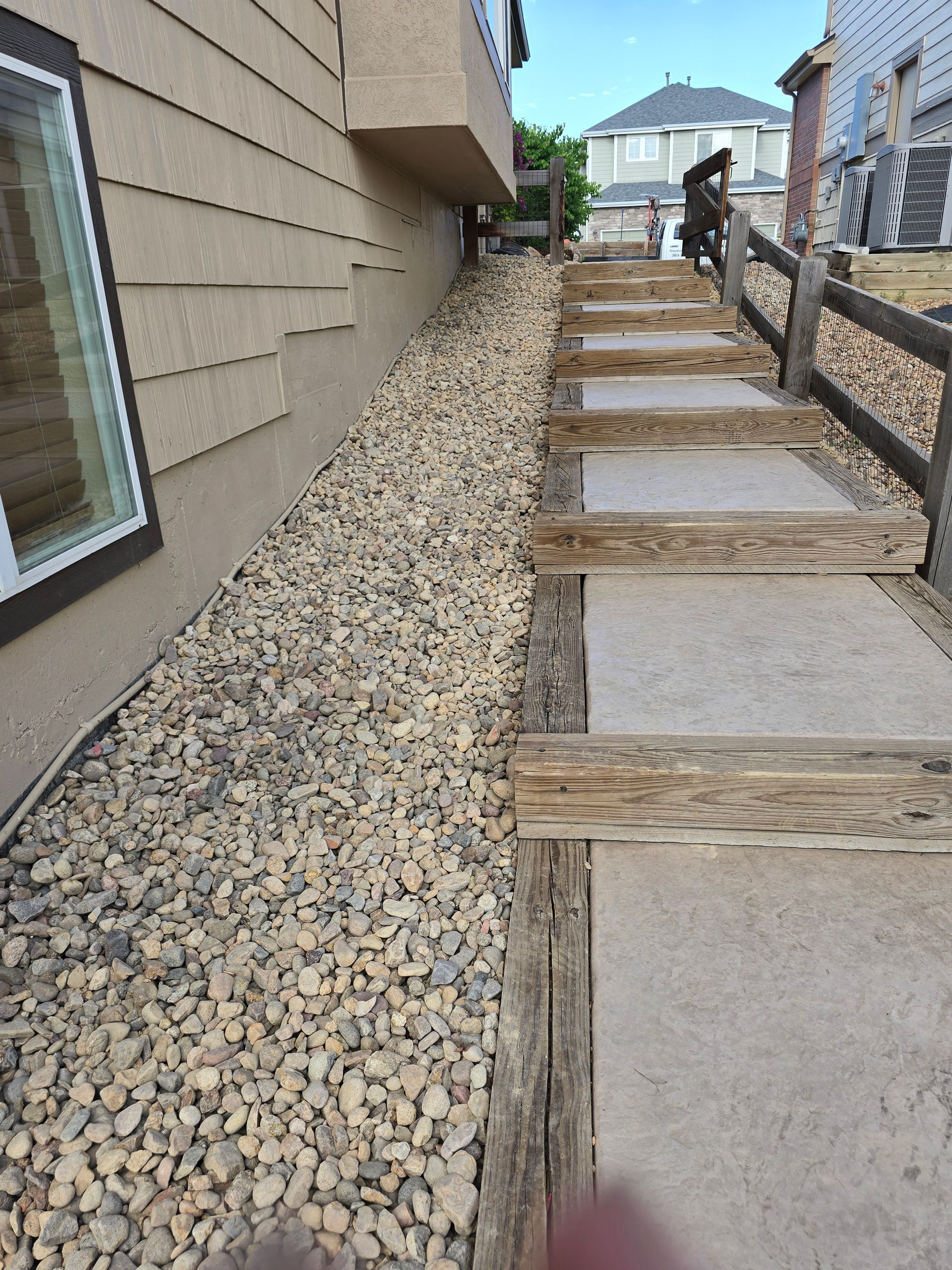 A row of wooden steps leading up to a house