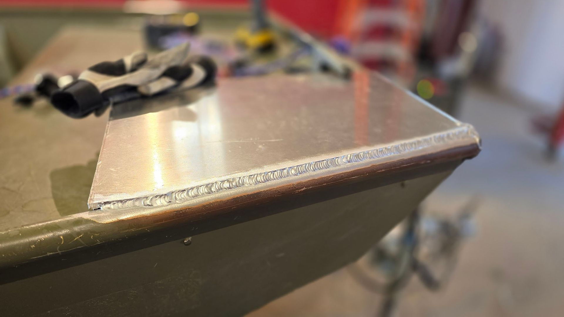 A close up of a piece of metal on a table.