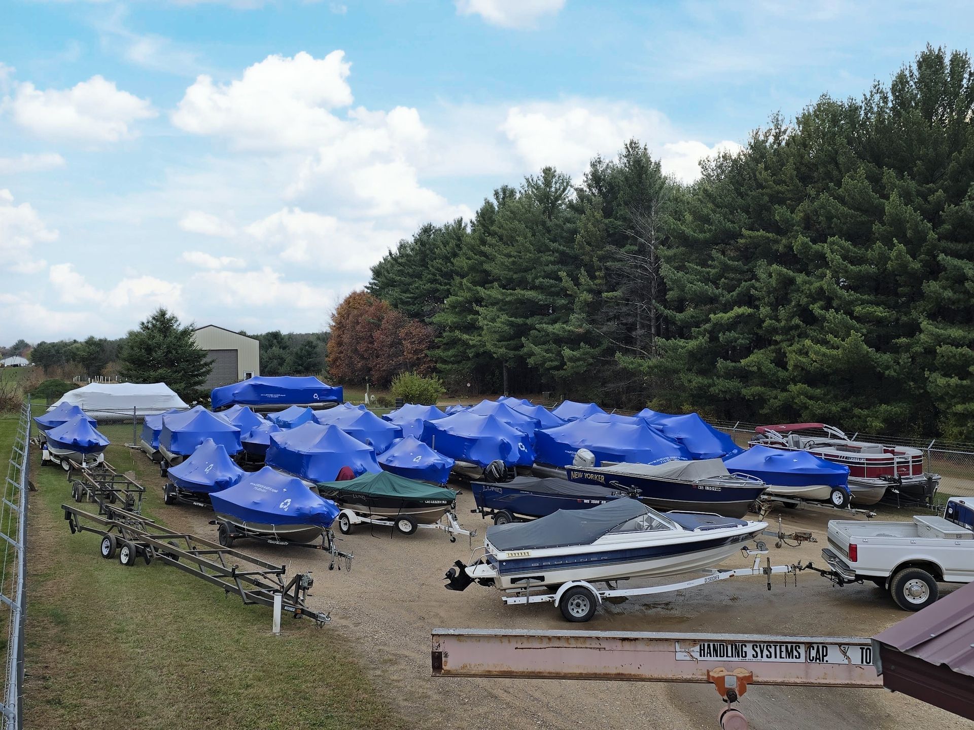 Large number of boats shrink wrapped and stored for winter at Anchor Marine in Menomonie Wisconsin serving boat owners from Eau Claire and the Chippewa Valley