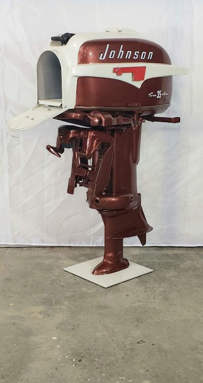 Vintage Johnson Seahorse outboard motor converted into custom mailbox at Anchor Marine in Menomonie Wisconsin