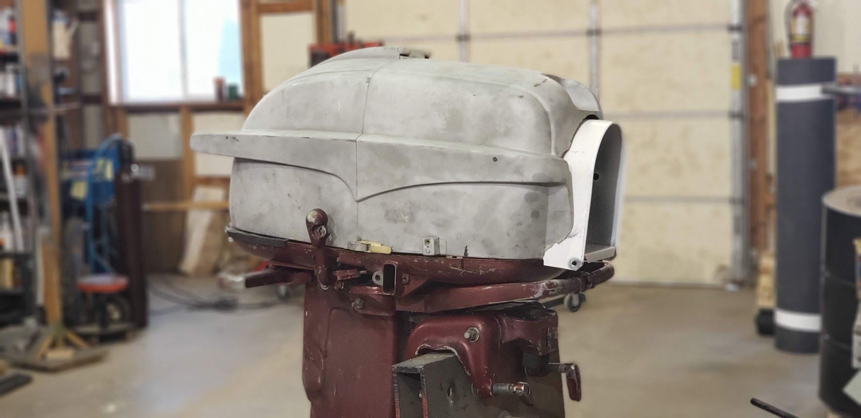Vintage Johnson Seahorse outboard restoration converted into custom mailbox at Anchor Marine in Menomonie Wisconsin