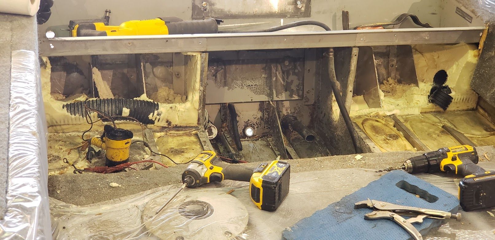 Internal flotation foam and structure exposed during Lund aluminum boat transom repair at Anchor Marine in Menomonie Wisconsin serving the Eau Claire and Chippewa Valley area