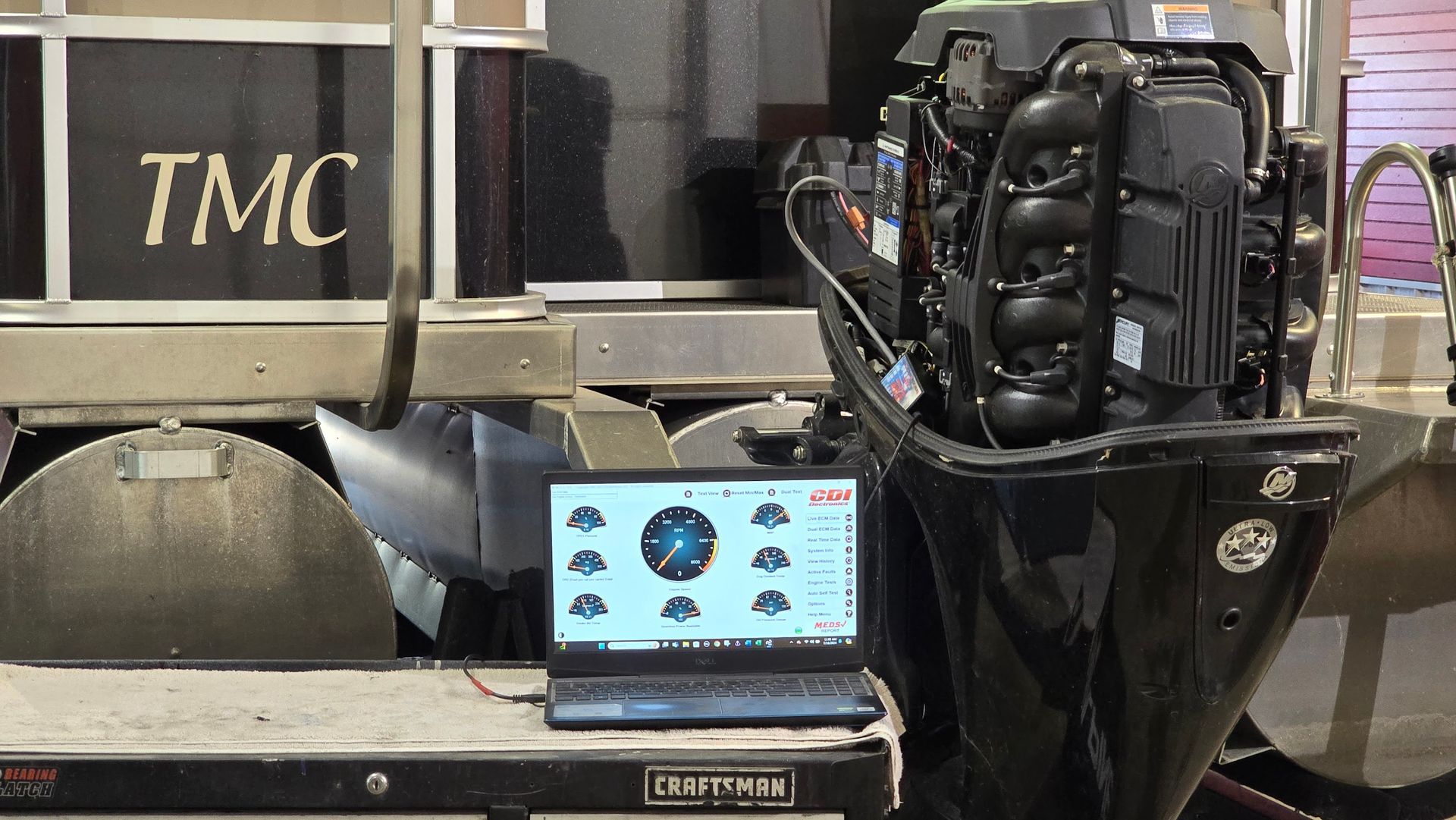 Mercury outboard engine connected to CDI Electronics M.E.D.S. diagnostic software for engine troubleshooting and problem solving