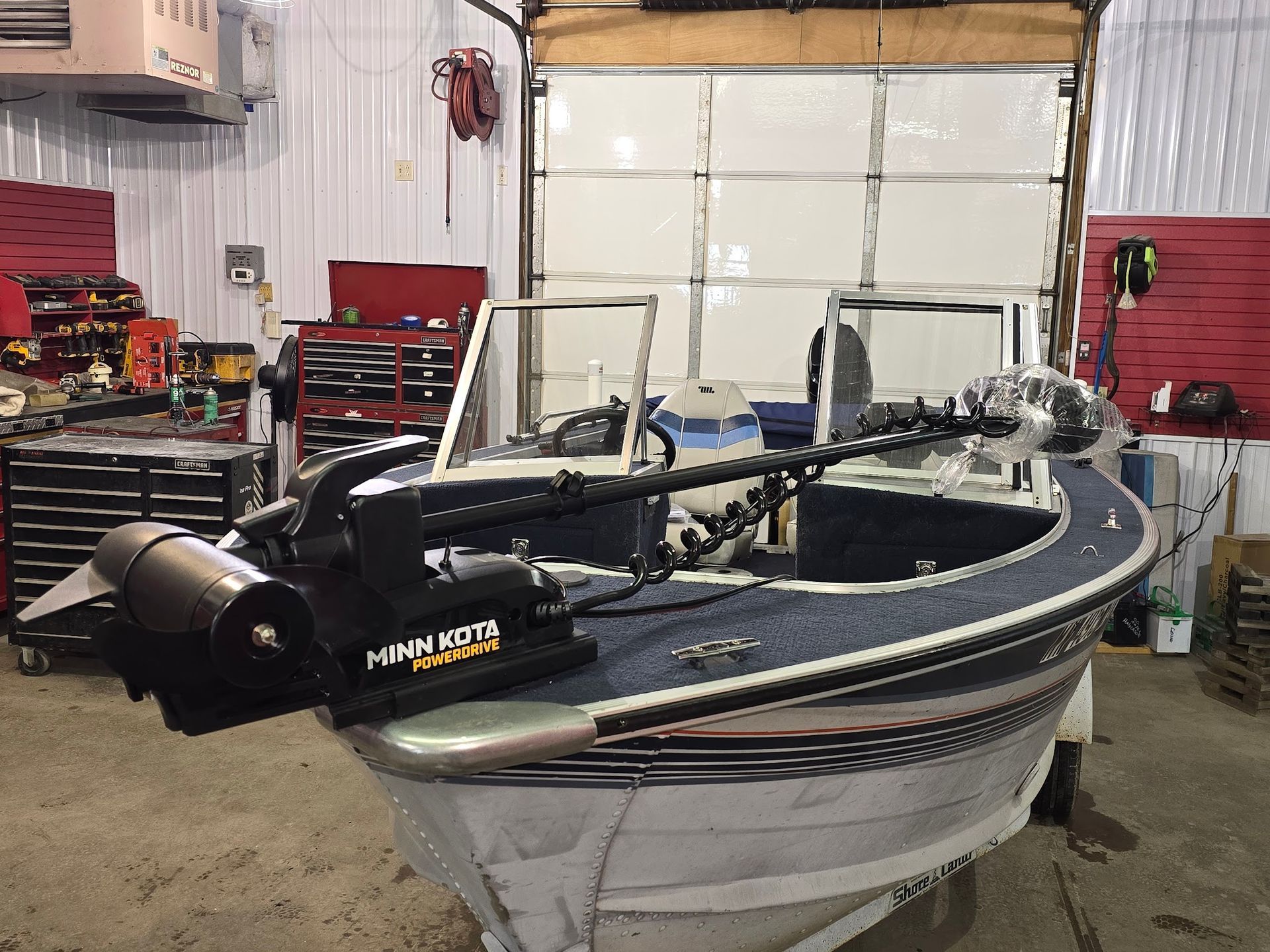 Minn Kota PowerDrive bow mount trolling motor installed on aluminum fishing boat