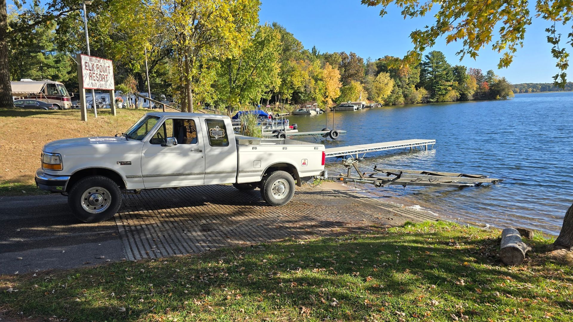 pontoon pickup and delivery service on Lake Menomin and Lake Tainter near Eau Claire Wisconsin with fully insured transport to and from storage and repair