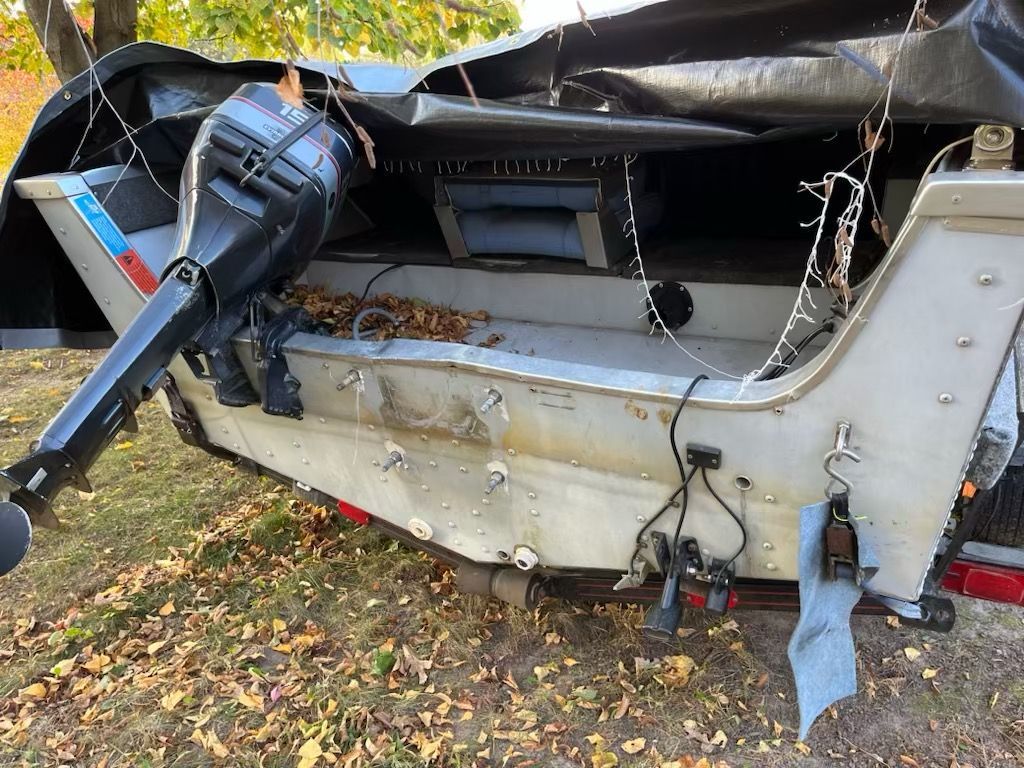 Sea Nymph aluminum fishing boat with rotten transom before repair at Anchor Marine in Menomonie Wisconsin serving the Eau Claire and Chippewa Valley area