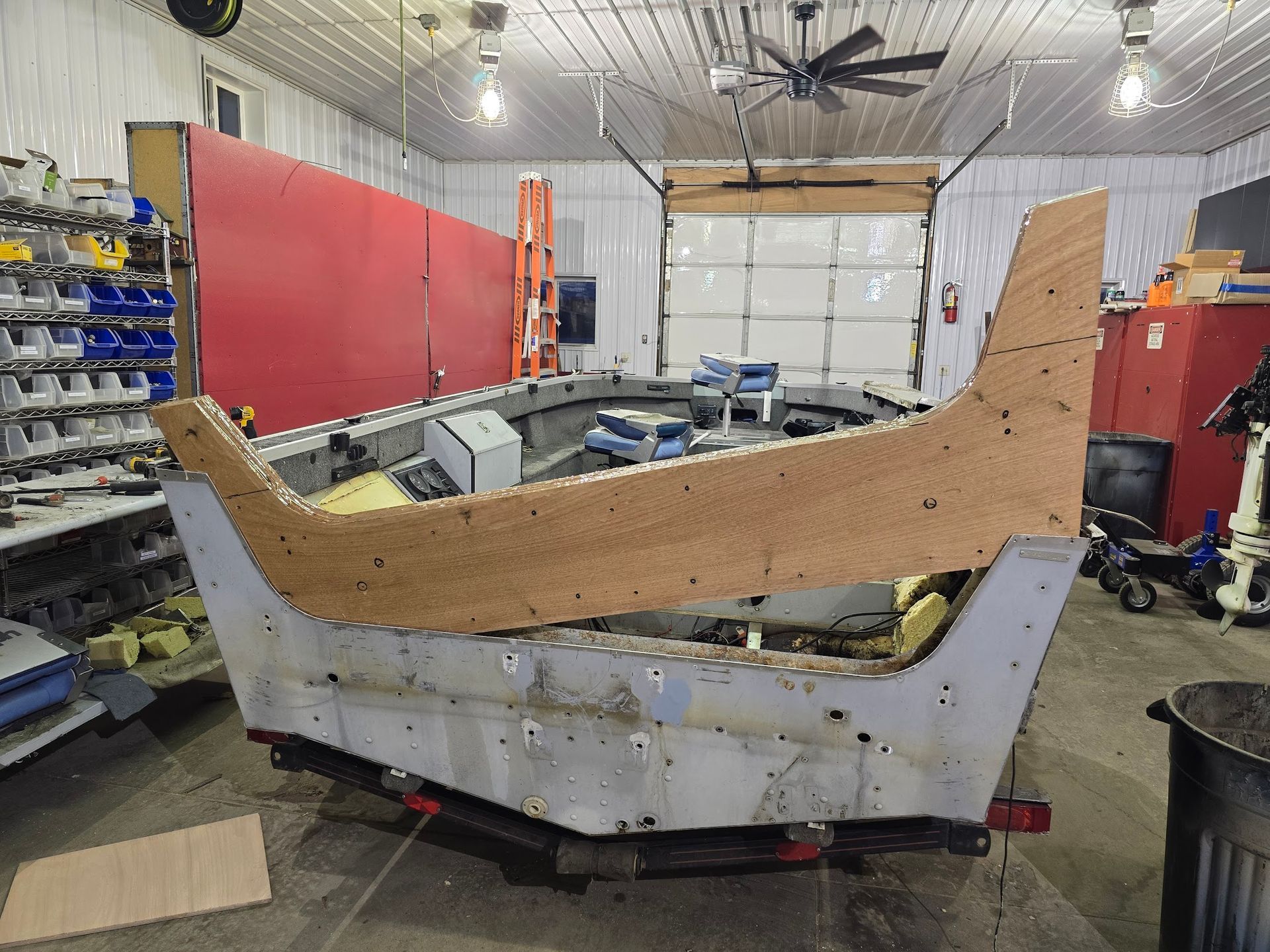 New marine plywood transom core sealed with fiberglass resin during Lund boat transom replacement at Anchor Marine in Menomonie Wisconsin serving the Eau Claire and Chippewa Valley area