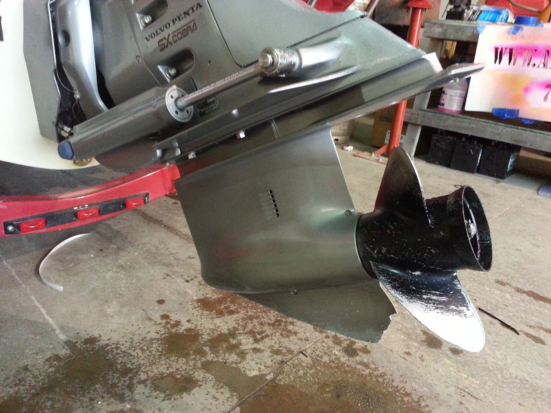 Volvo Penta sterndrive with propeller impact damage from underwater strike with marine insurance repair and lower unit service by Anchor Marine near Eau Claire and Menomonie Wisconsin