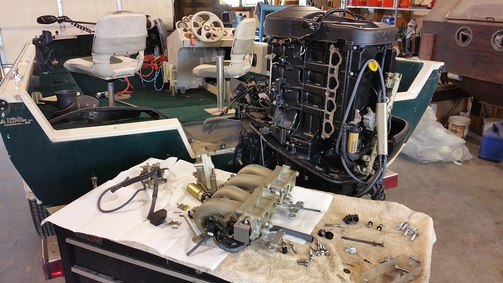 Yamaha outboard EFI intake manifold removed during electronic fuel injection system repair at Anchor Marine in Menomonie Wisconsin serving the Eau Claire boating area
