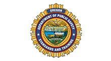 The logo for the oregon department of public safety standards and training.