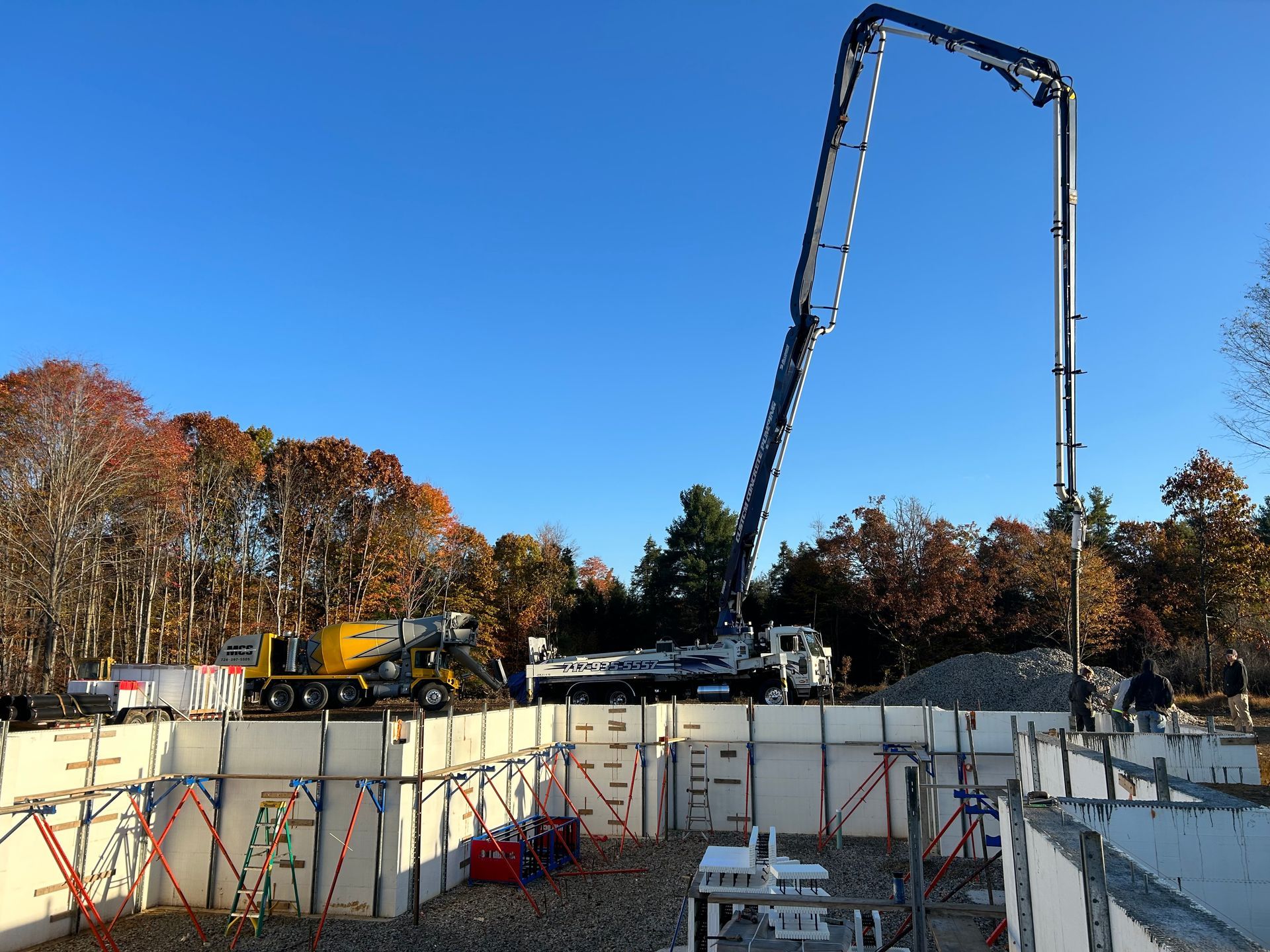 A concrete pump is being used on a construction site