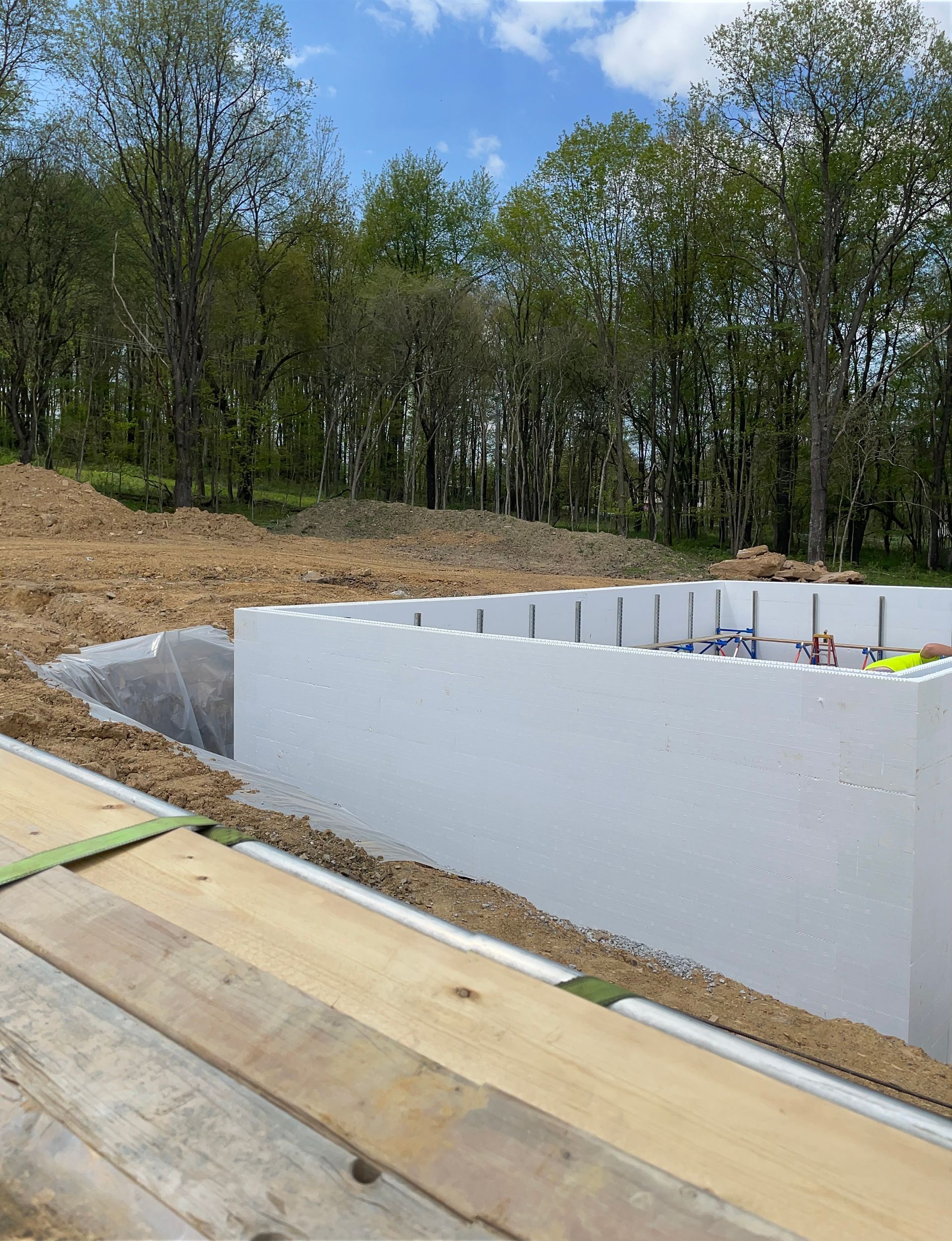 A large white wall is sitting on top of a wooden table.