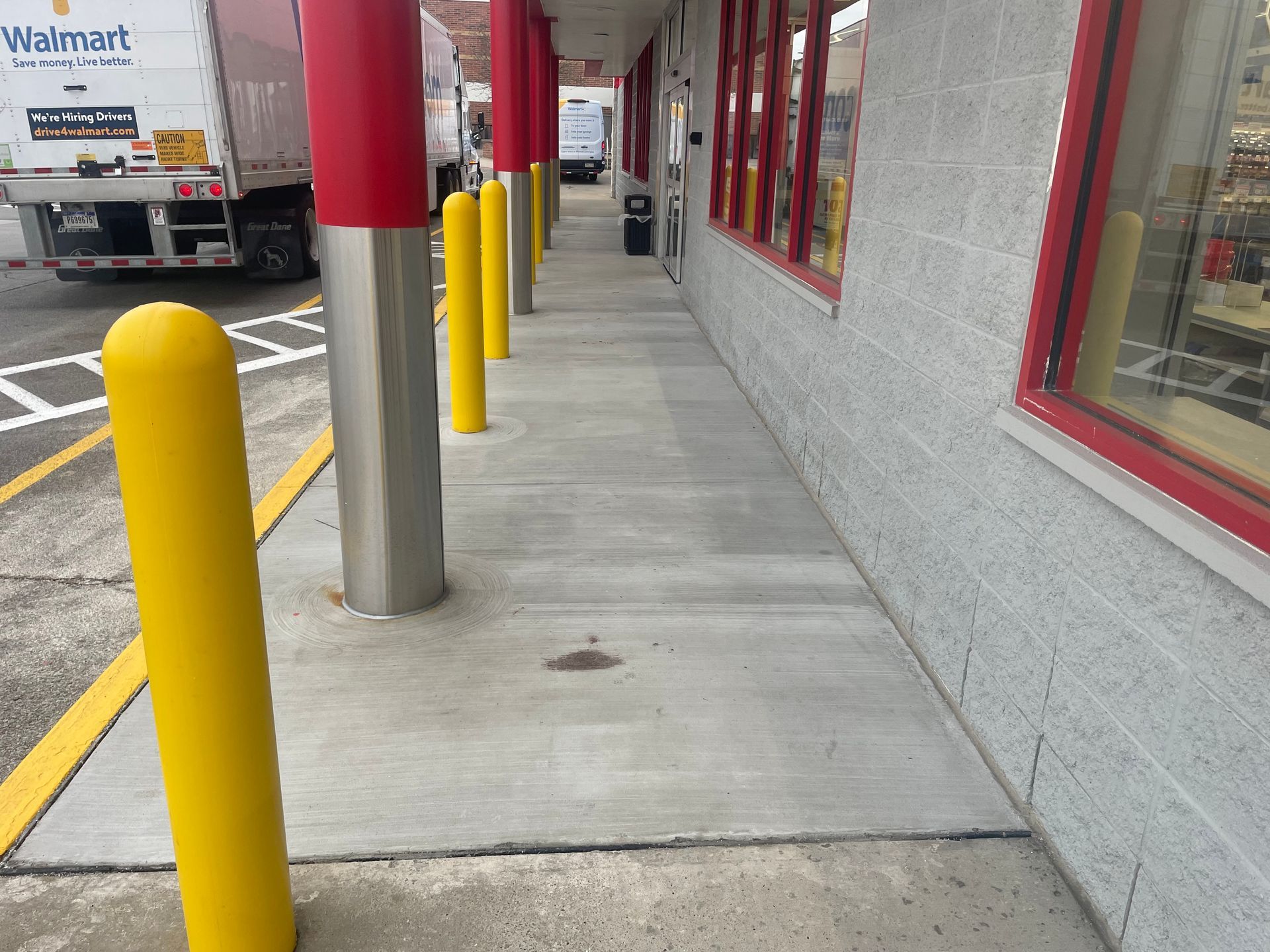 A walmart truck is parked on the side of the road